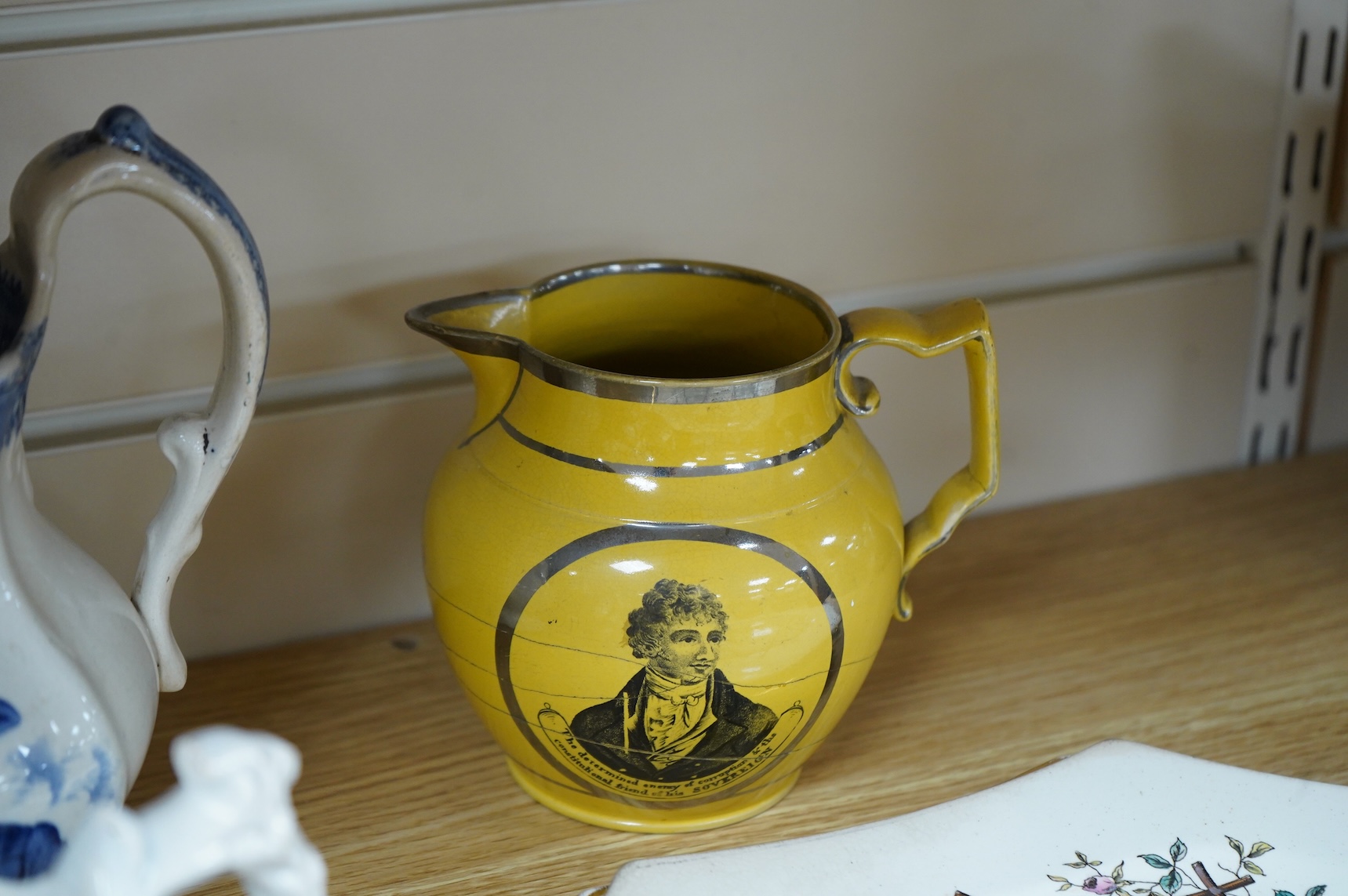 Eleven early to mid 19th century jugs, mugs and plates, all with transfer printed commemorative themes including Gladstone as Prime Minister, Queen Victoria‘s 1887 Jubilee, the Bidston Lighthouse Signals, Lord John Russe